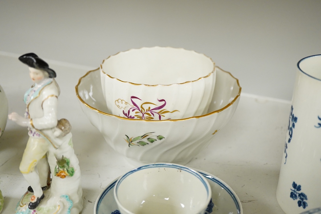 18th century mixed Worcester etc, including blue and white tableware together with two figurines etc, teapot, 13cm high (13).